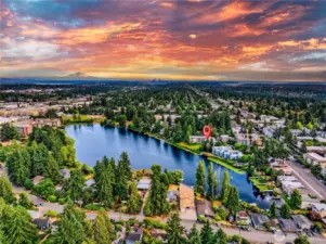From sunrise to sunset, your top-corner penthouse frames the beauty of Bitter Lake with panoramic views, private dock privileges, and an unbeatable location
