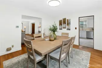 The dining room is open to the living room and nicely connects to the kitchen.
