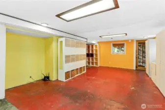 Another view of the spacious rec room with access to the backyard.