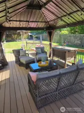 Another view of the deck with furniture.