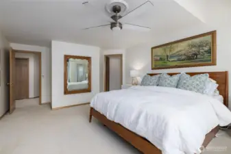 Primary suite. Ceiling fans in the bedrooms.