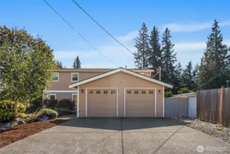 Spacious 2 car garage with room for storage.