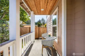Front porch with room for relaxing or to line with plants and decorations.