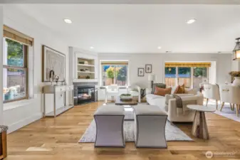 A formal living room with gas fireplace for those cool PNW evenings.