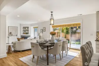 Spacious dining area to gather and eat, as well as access to the back yard.