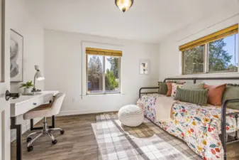 The second of 2 upper floor guest rooms with walk-in closet.