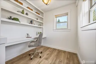 Built in desk space on the upper floor for all of your work, craft, or storage needs.
