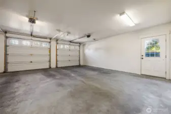 The spacious attached 2 car garage has room for additional storage.