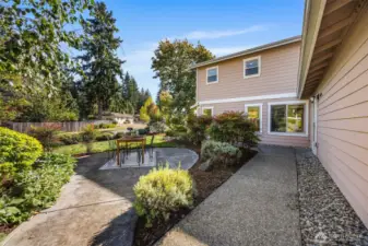 The front yard has space to relax or dine.
