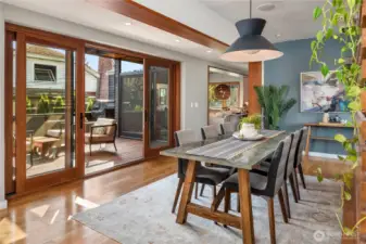 Dining flows naturally to the deck, combining elegance and function for effortless gatherings.