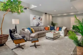Flexible lower-level living with space to gather, lounge, or entertain with ease.
