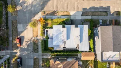 Bird’s-eye view of the home highlights its striking roofline and private corner lot.