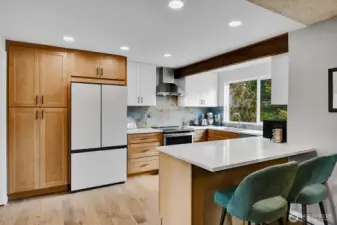 Designed for connection, the kitchen flows seamlessly into the living and dining rooms—perfect for entertaining and everyday living.