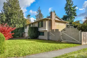 A large gate provides easy access for storing boats, RVs, or other recreational equipment.