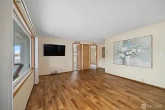 Second living area leading to 2 bedrooms and 1 full bathroom.