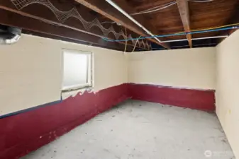 Unit #2015: One of the areas in the unfinished basement.