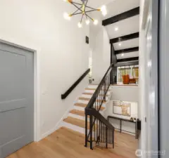Spacious entry way leads you into this gorgeous remodeled home, with no surface left untouched.