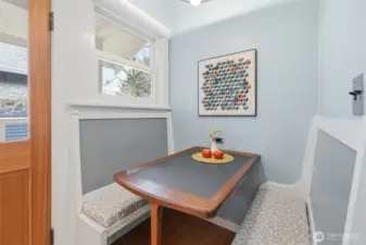 Original built-in breakfast nook in the eat-in kitchen.