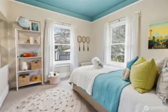 Second bedroom on the main floor with a large closet and new double-pane windows.