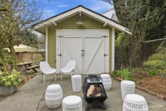 Level patio is a great spot to gather with friends around the fire pit.