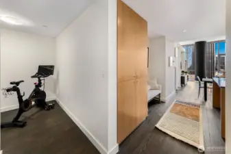 Den space at the entry can be used as you wish. Built-ins add extra storage options.