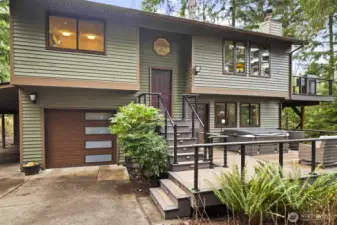 Impressive exterior upgrades include new paint, new windows, a new garage door, and professionally curated landscape lighting that enhances the home’s curb appeal.