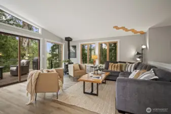 Free-standing wood stove on upper floor.