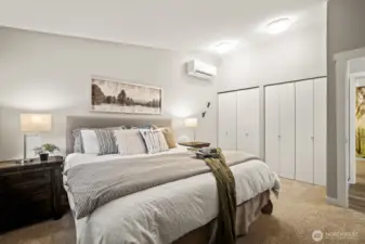 Primary bedroom featuring double closets for ample storage.