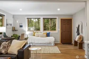 Lower level features a private entrance and access to the lower deck with a hot tub.