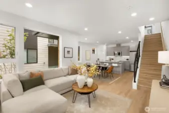 The main floor features a versatile bedroom suite, ideal for guests or a quiet home office setup.