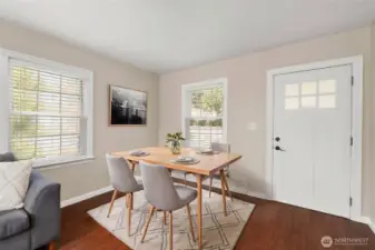 Virtually staged dining area in great room