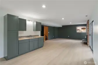 With the addition of a refrigerator and a range and/or micro wave, this would make a great space for multi-generational living, possibly a short or long term rental situation because....