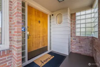 Covered entry with a grand front door!