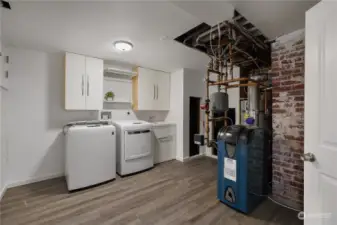 LAUNDRY ROOM | WASHER & DRYER | UTILITY SINK | BASEBOARD BOILER | WATER HEATER