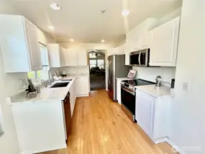 Beautiful kitchen with hardwood floors.