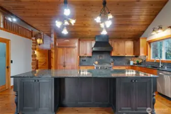 Vaulted Kitchen with Granite and Wolf Range