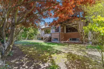 Located high above the street, this sweetie home is ready for your updates and special touches.
