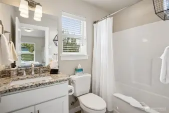 Full bathtub/shower in the second suite.