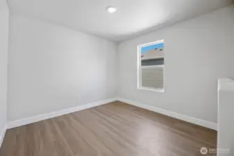 Lofted area with plank flooring