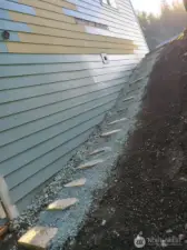 Side Stone Step Way towards back basement entrance