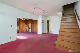 Looking toward dining area or possible extra seating area.