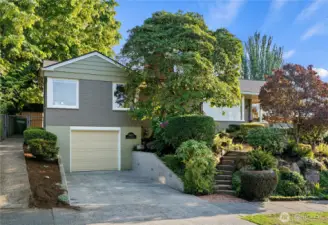 Perched on a desirable corner lot, this masterpiece boasts sweeping views of the Sound and surrounding mountains. A spacious 2-car tandem garage, along with additional driveway parking, offers both convenience and flexibility. Also, enjoy such creature comforts as a whole-house fan and both electric and manual sunshades!