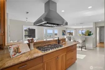 A 5-burner gas cooktop is perfect for multitasking meals, and having a Subzero fridge means you’re always stocked with fresh ingredients. Plus, the walk-in pantry is a game-changer for organization.
