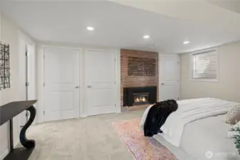 You'll love the lower-level Ensuite Primary bedroom with its cozy gas fireplace!