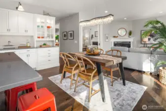 A custom chandelier anchors the space.
