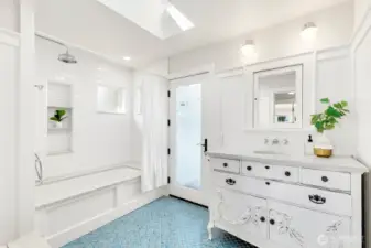 Shared bathroom upstairs is light and airy. Also has access to the deck.