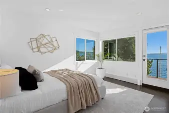 The second bedroom on the upper level has it's own deck with incredible views of the water and mountains