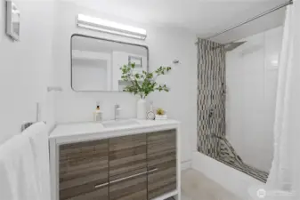 This 3/4 bathroom on the upper level features imported Greek Thassos marble, Carrara and Grohe thermostatic mixing valves and fixtures