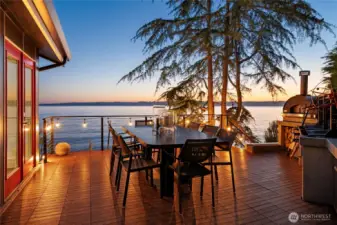Just off of the living room is the custom built outdoor kitchen with new composite decking. You'll want to eat out here for every meal!