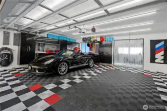 The two car garage was designed for car enthusiasts with all of the bells & whistles - an air compressor, auto-spceific pressure washer, built in vacuum for detailing, and so much more.